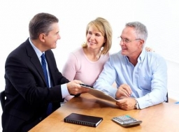 Senior couple with financial adviser.