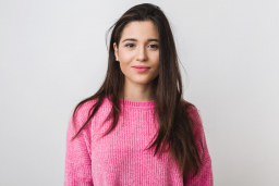 young-beautiful-woman-pink-warm-sweater-natural-look-smiling-portrait-isolated-long-hair.jpg