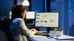busy-woman-working-night-front-computer-taking-notes-writing-notebook-annual-reports-checking-financial-project-focused-employee-using-technology-network-wireless-doing-overtime-job.webp