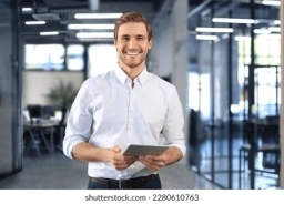 handsome-businessman-using-his-tablet-260nw-2280610763 man2 (1).webp